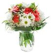 Radiating warmth and lively charm, this expertly arranged bouquet captures the essence of a bright morning in Harrow on the Hill-a blend of tradition and fresh optimism. Soft, coral-pink carnations form the spirited core, each petal delicately ruffled and catching the day's light. Dotted among them, white chrysanthemums and crisp daisies evoke the purity of spring and the cheerfulness of hillside gardens near Harrow School. Tiny, cloud-like blooms of baby's breath weave between the larger flowers, softening the silhouette with their airy texture. A few magenta alstroemeria buds, not yet open, promise future color and depth, subtly set to the side. The lush collar of rich green foliage-some glossy, some matte-encircles the bouquet, grounding it in a natural, effortless beauty. Arranged in a crystal-clear glass vase that reveals every upright stem and the clear water below, the composition feels refreshingly vibrant. The white background allows every color and detail to stand out, while the balanced lighting enhances the bouquet's sense of freshness and positivity. Ideal for celebrating life's milestones, extending gratitude, or simply uplifting a loved one in Harrow on the Hill, this bouquet is a testament to local floral artistry-available for thoughtful, same-day delivery throughout the community.